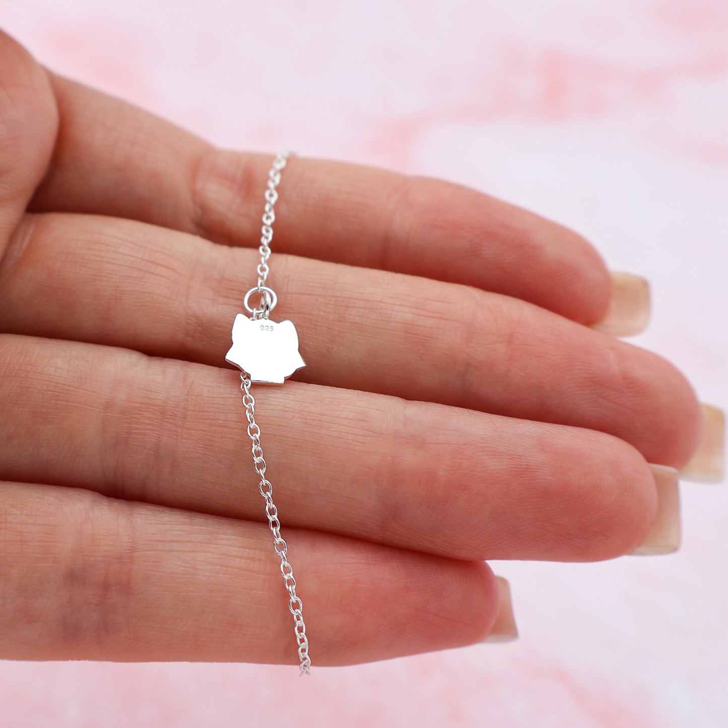 Pulsera con búho rosa y 3 corazones