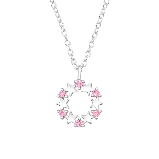 Collar con colgante redondo con estrellas y circonitas rosas