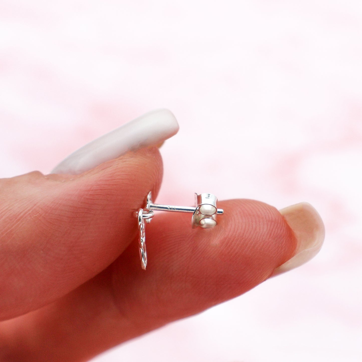 Stud earrings with butterflies and flowers in shades of pink