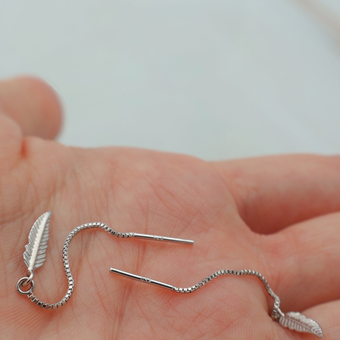 Pendientes de enhebrador de plumas