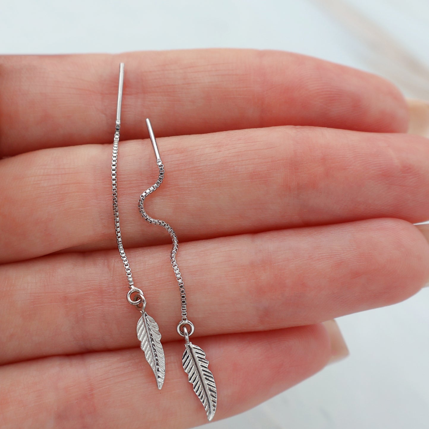Pendientes de enhebrador de plumas