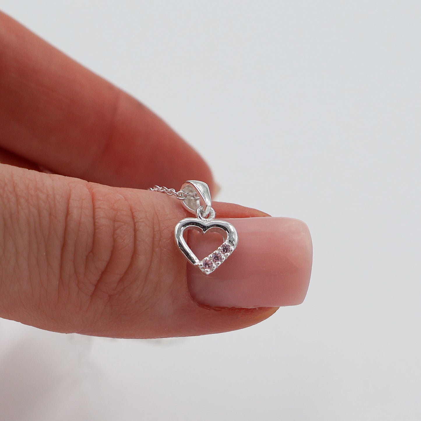 925 Sterling Silver Necklace with Hollow Heart Pendant and 3 Pink Sparkling Zirconia