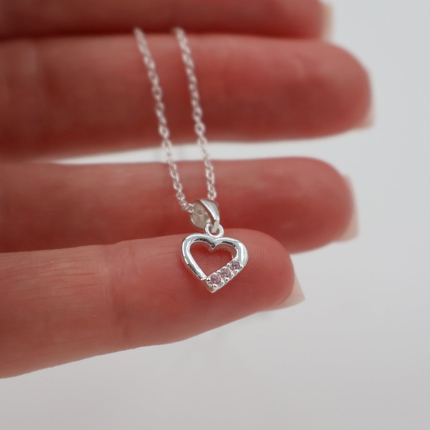 925 Sterling Silver Necklace with Hollow Heart Pendant and 3 Pink Sparkling Zirconia
