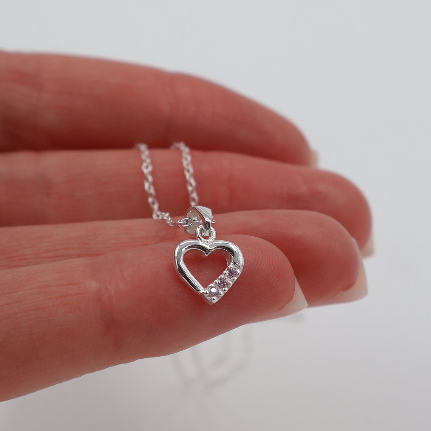 925 Sterling Silver Necklace with Hollow Heart Pendant and 3 Pink Sparkling Zirconia