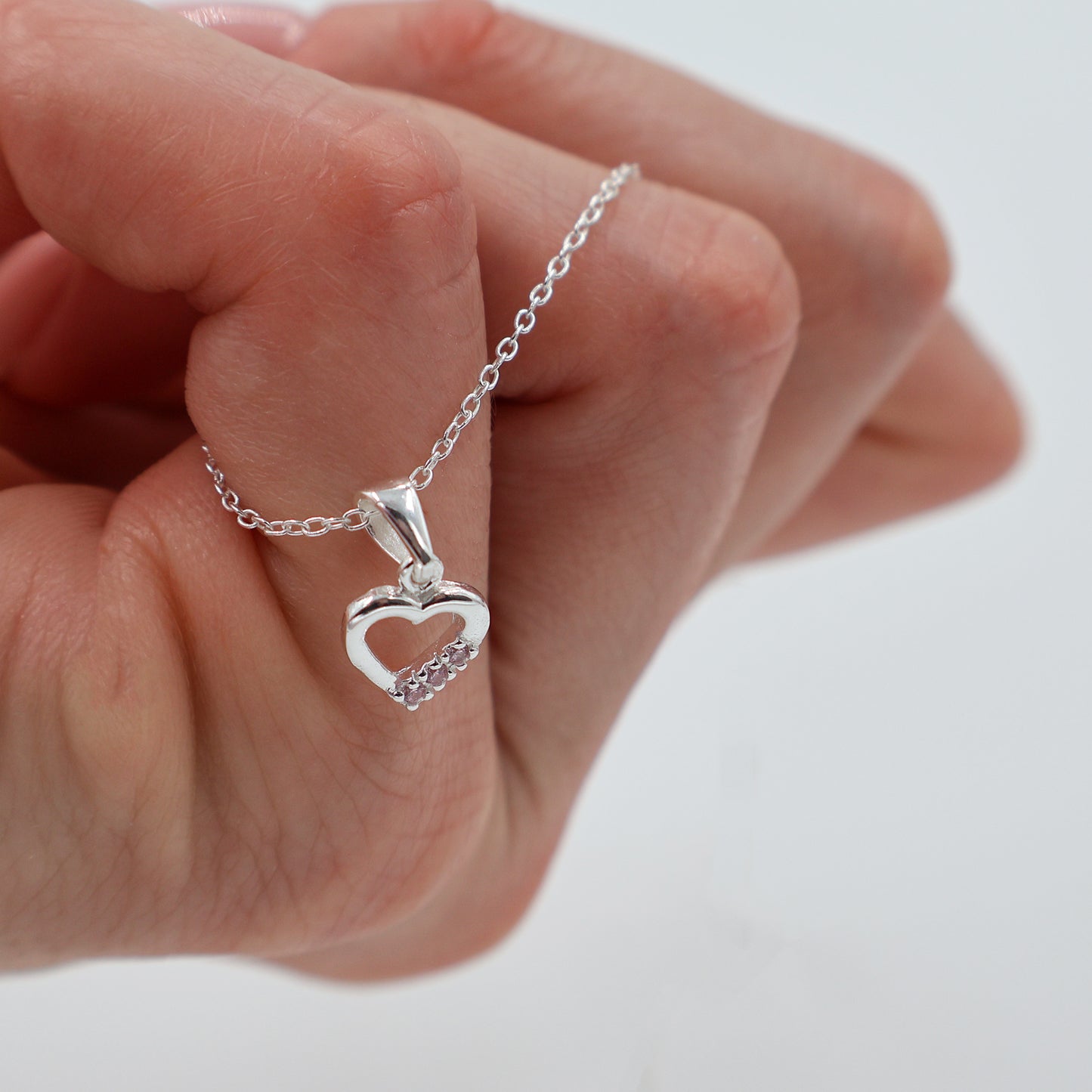 925 Sterling Silver Necklace with Hollow Heart Pendant and 3 Pink Sparkling Zirconia