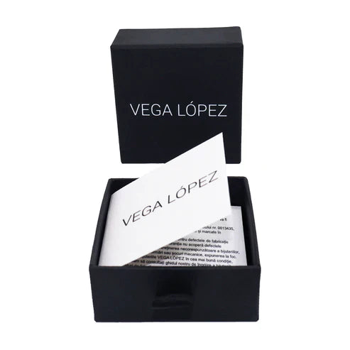 Vega López jewelry box with a soft textile interior, ideal for storing silver jewelry.