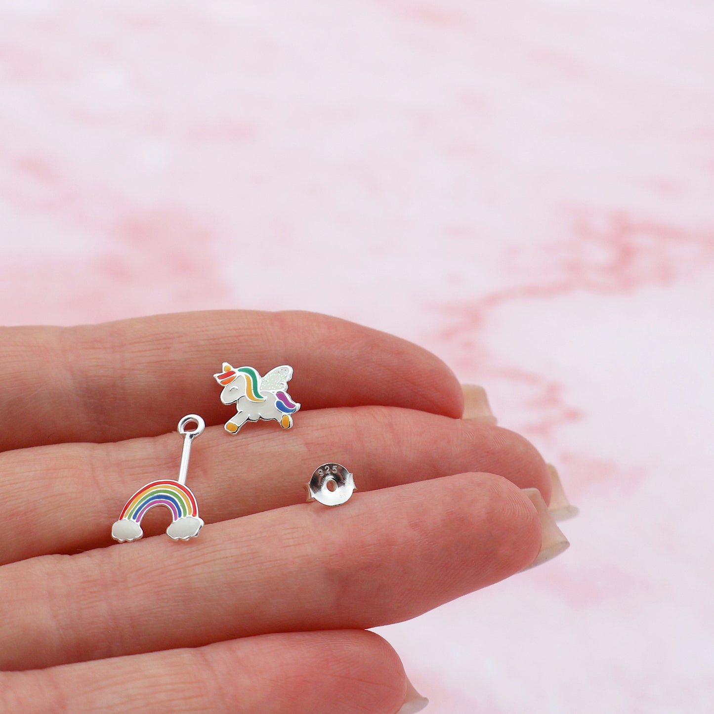 Stud earrings with a unicorn and a rainbow