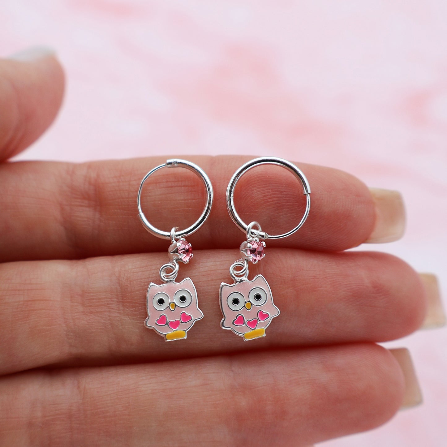 Round hook earrings with owls and pink crystals