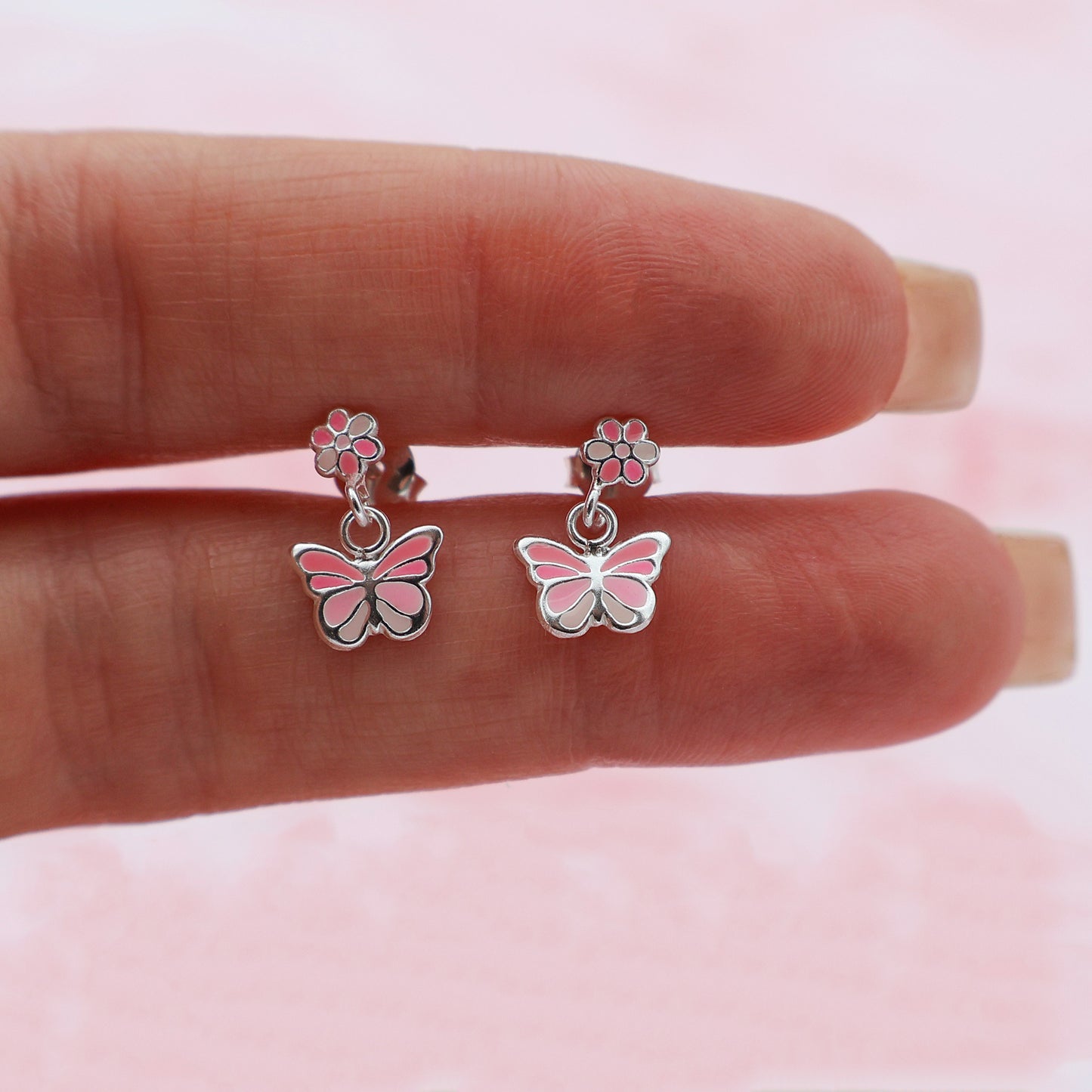 Stud earrings with butterflies and flowers in shades of pink