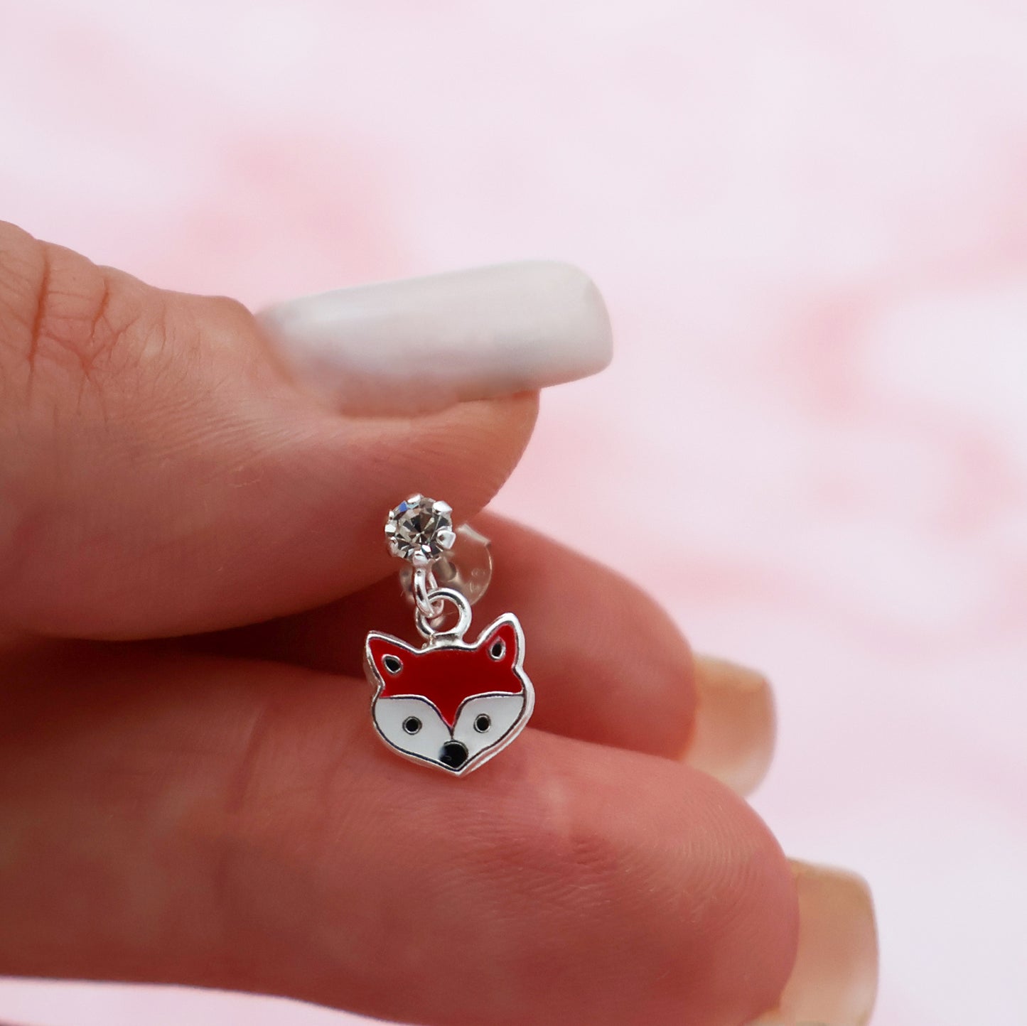 Stud earrings with foxes and white crystals