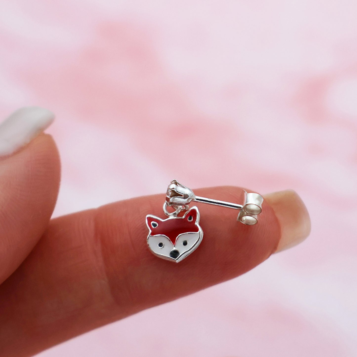 Stud earrings with foxes and white crystals