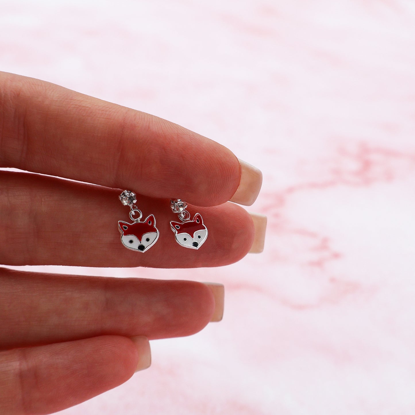 Stud earrings with foxes and white crystals