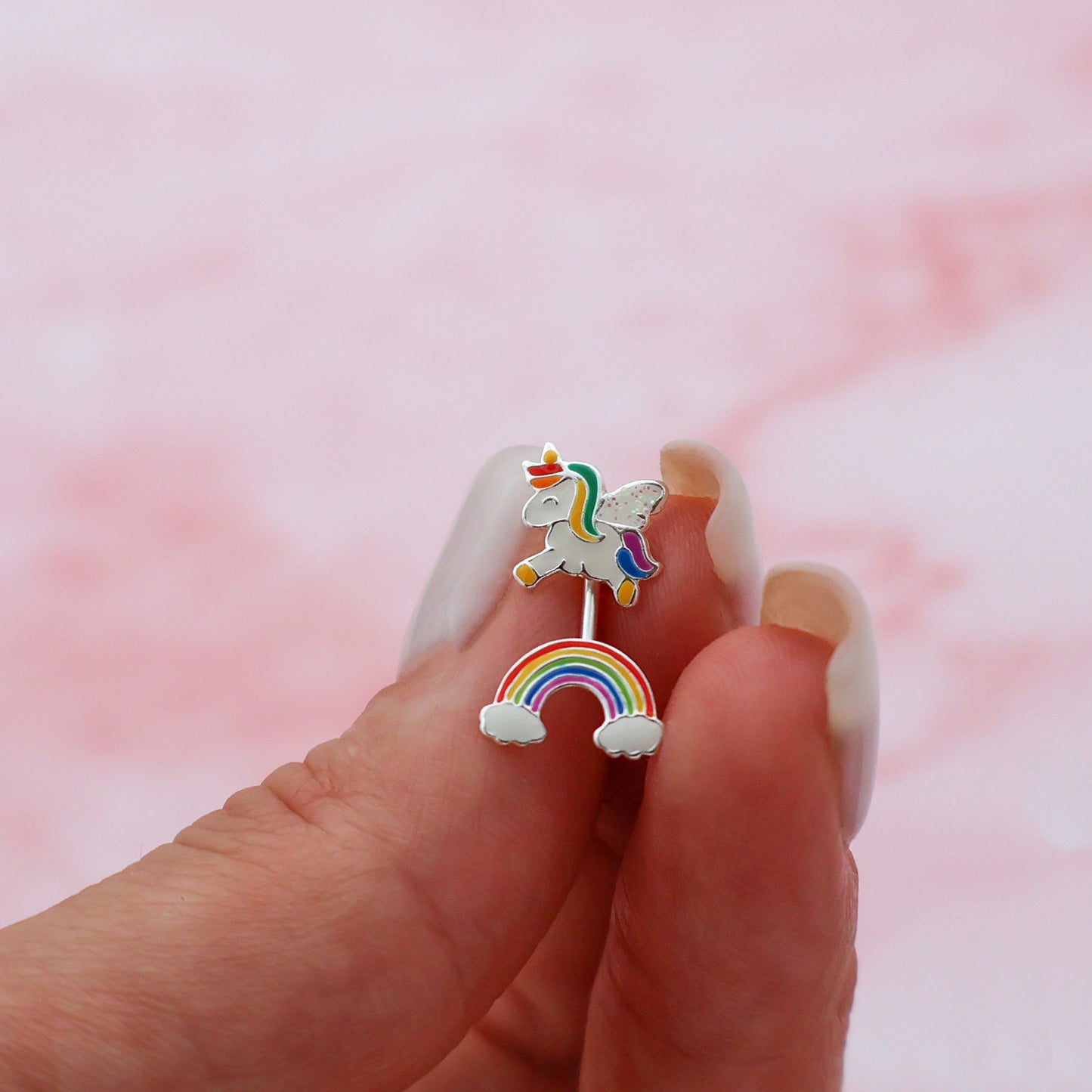 Stud earrings with a unicorn and a rainbow