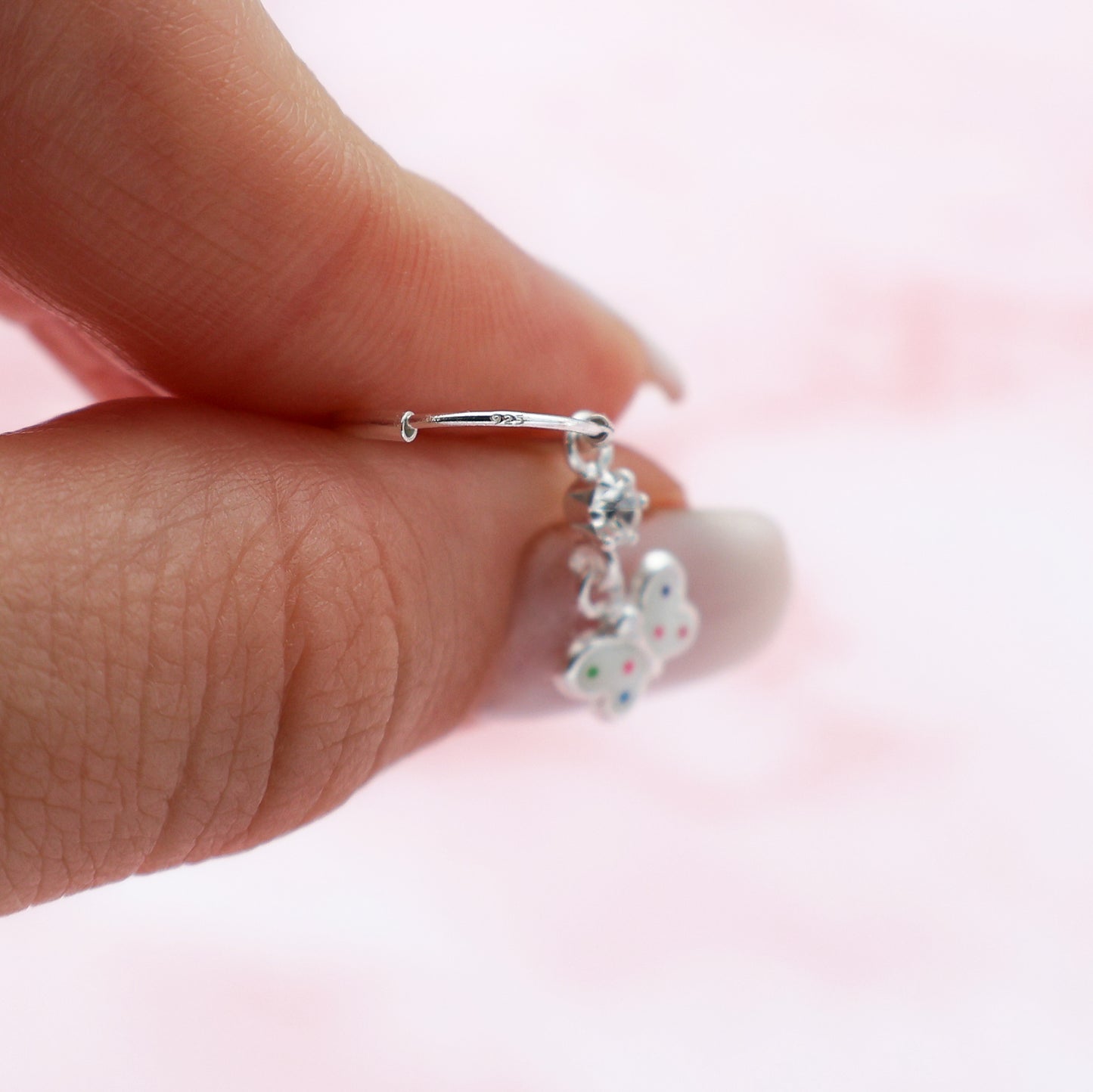 Round drop earrings with butterflies and white crystals