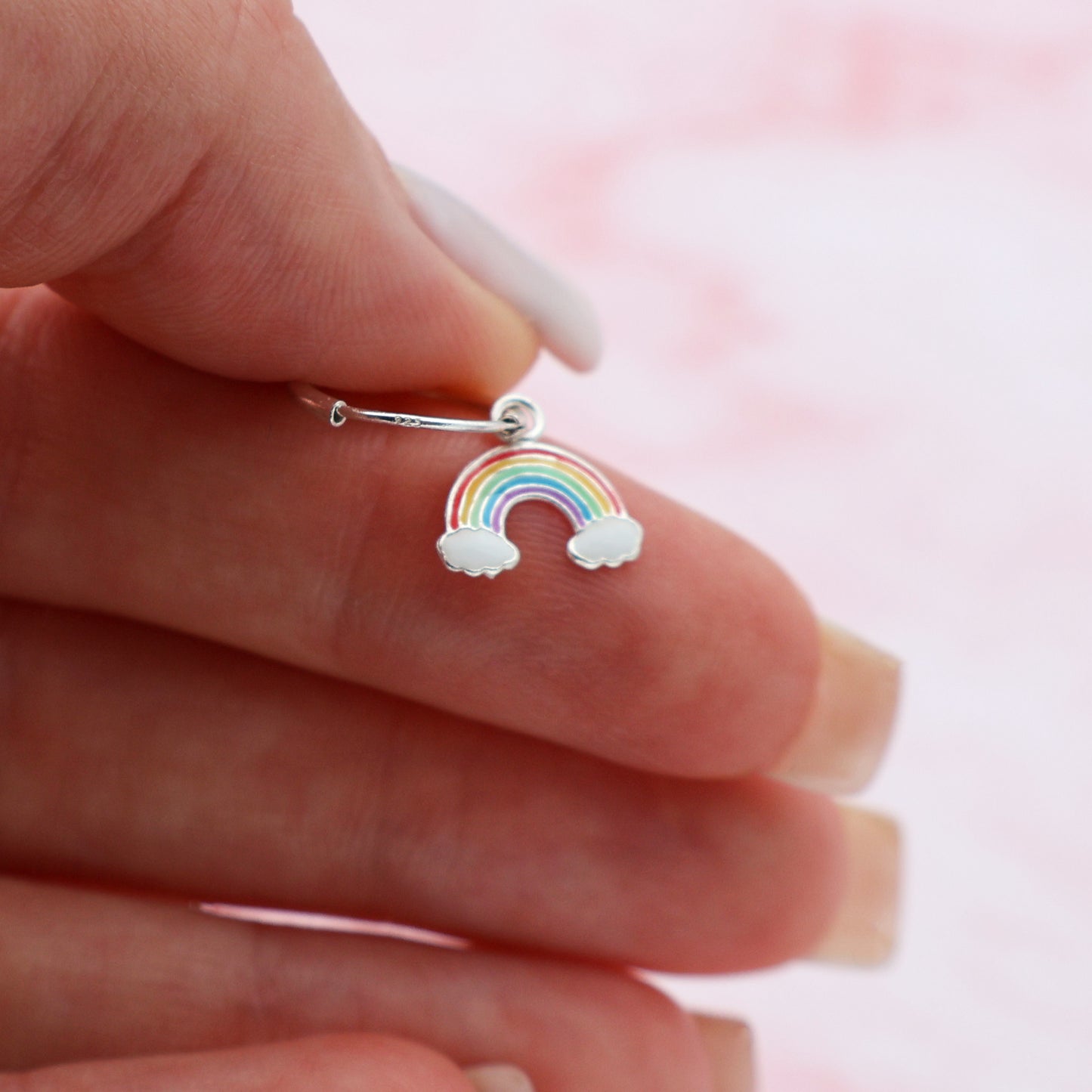 Round hook earrings with clouds and a rainbow