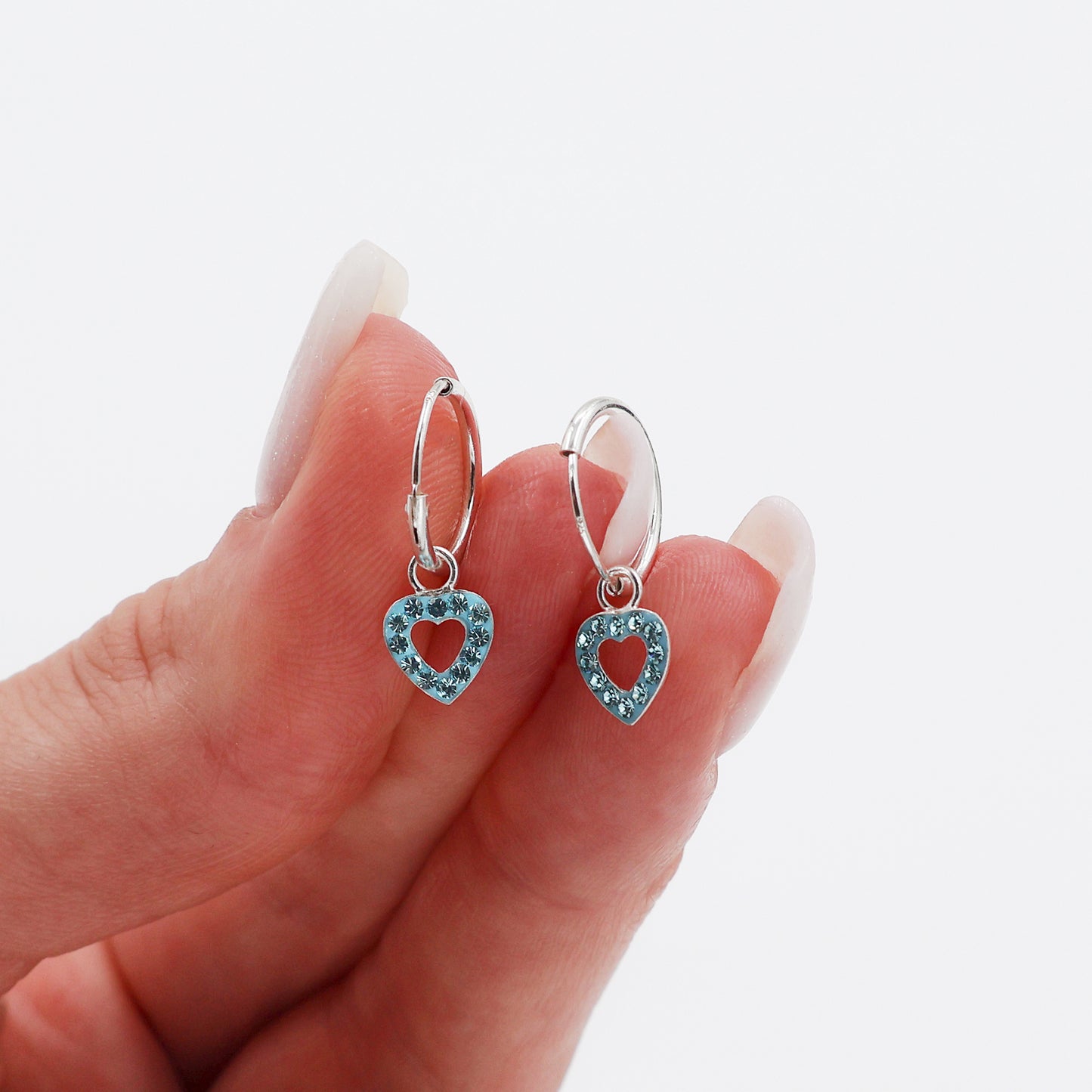 Creole earrings with a heart and 24 light blue crystals
