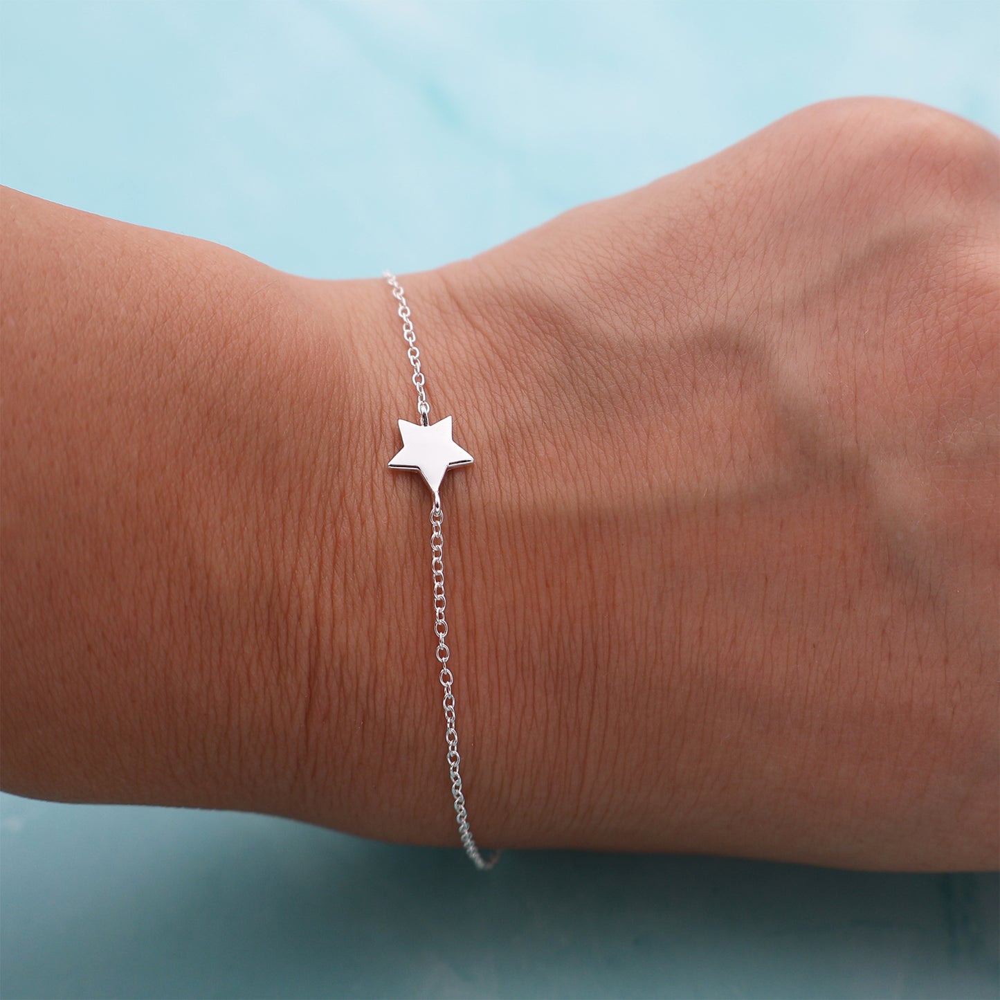 Bracelet with a fixed star pendant