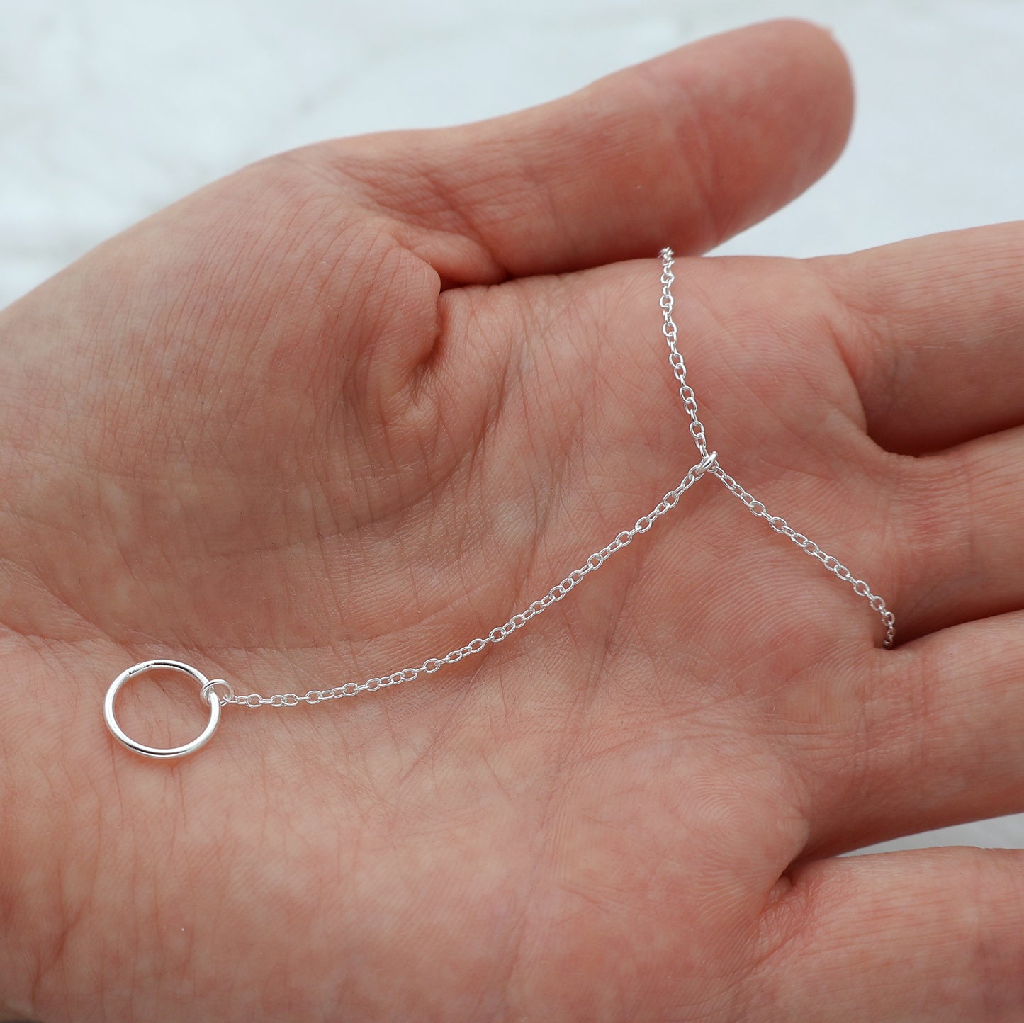 Necklace with an extender and a circle pendant