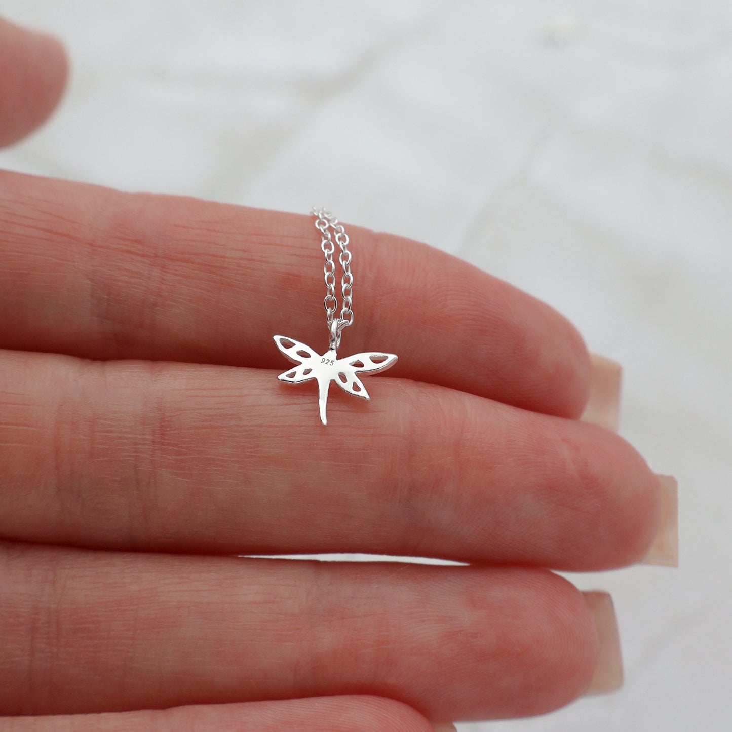 Necklace with a dragonfly pendant