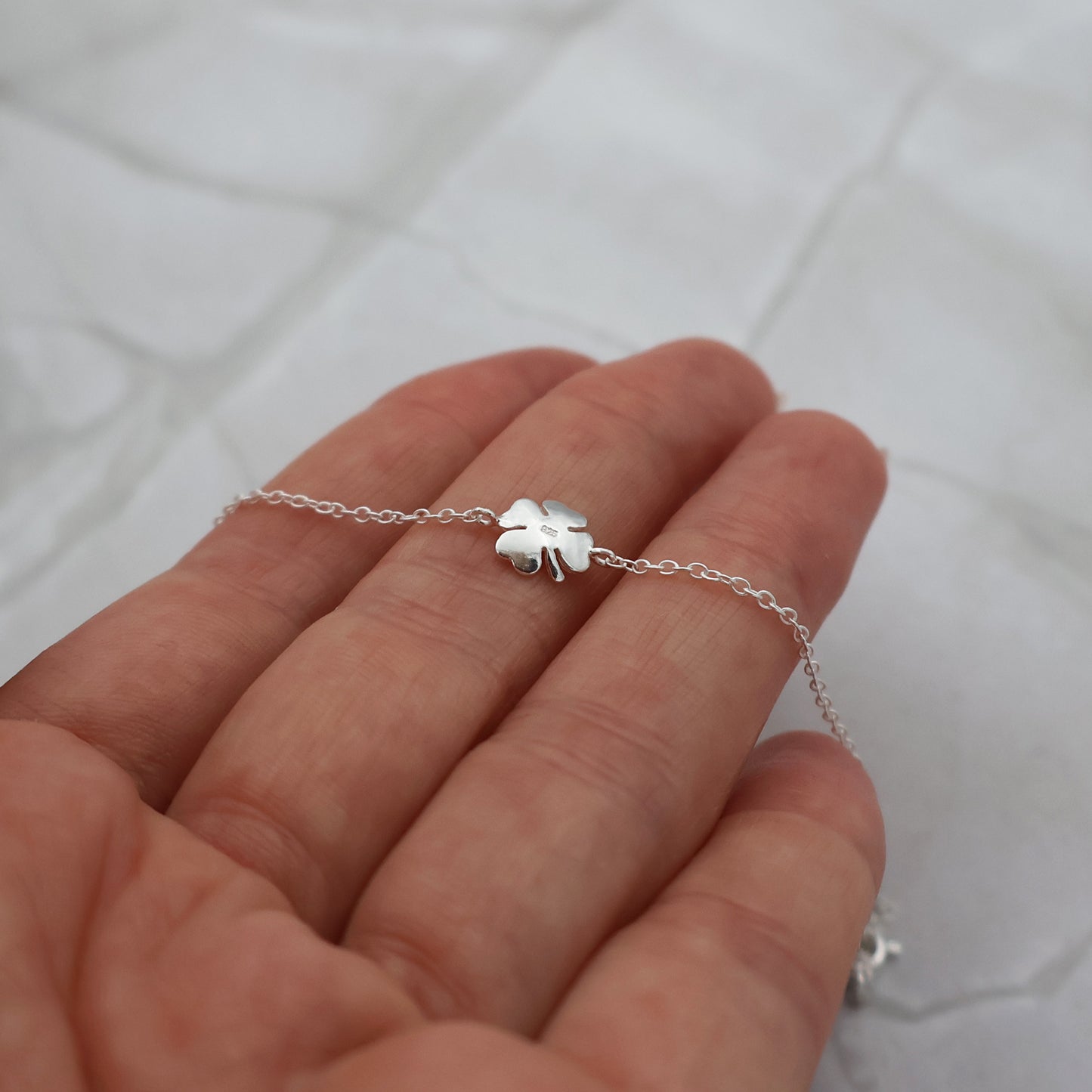 Bracelet with a four-leaf clover pendant