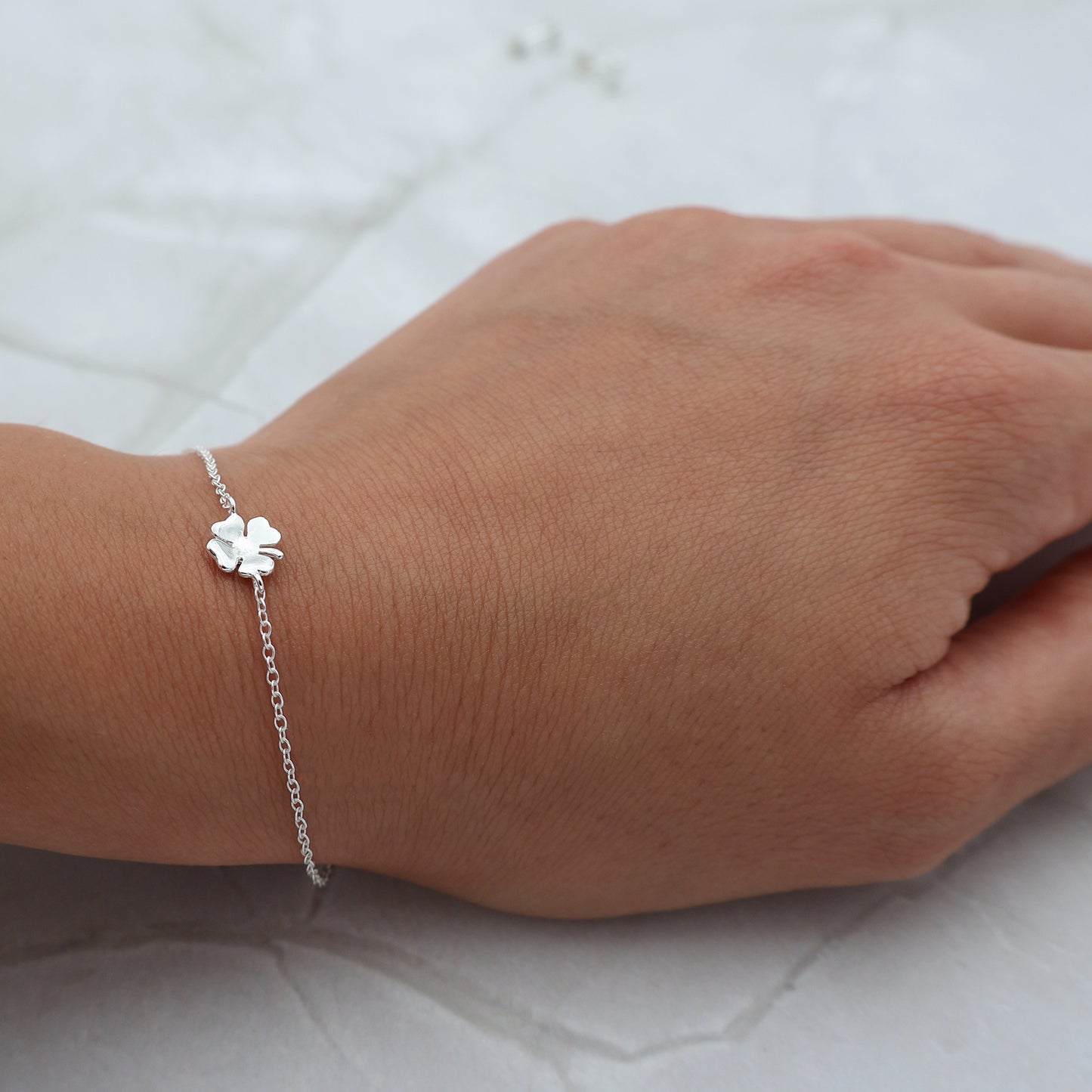 Bracelet with a four-leaf clover pendant