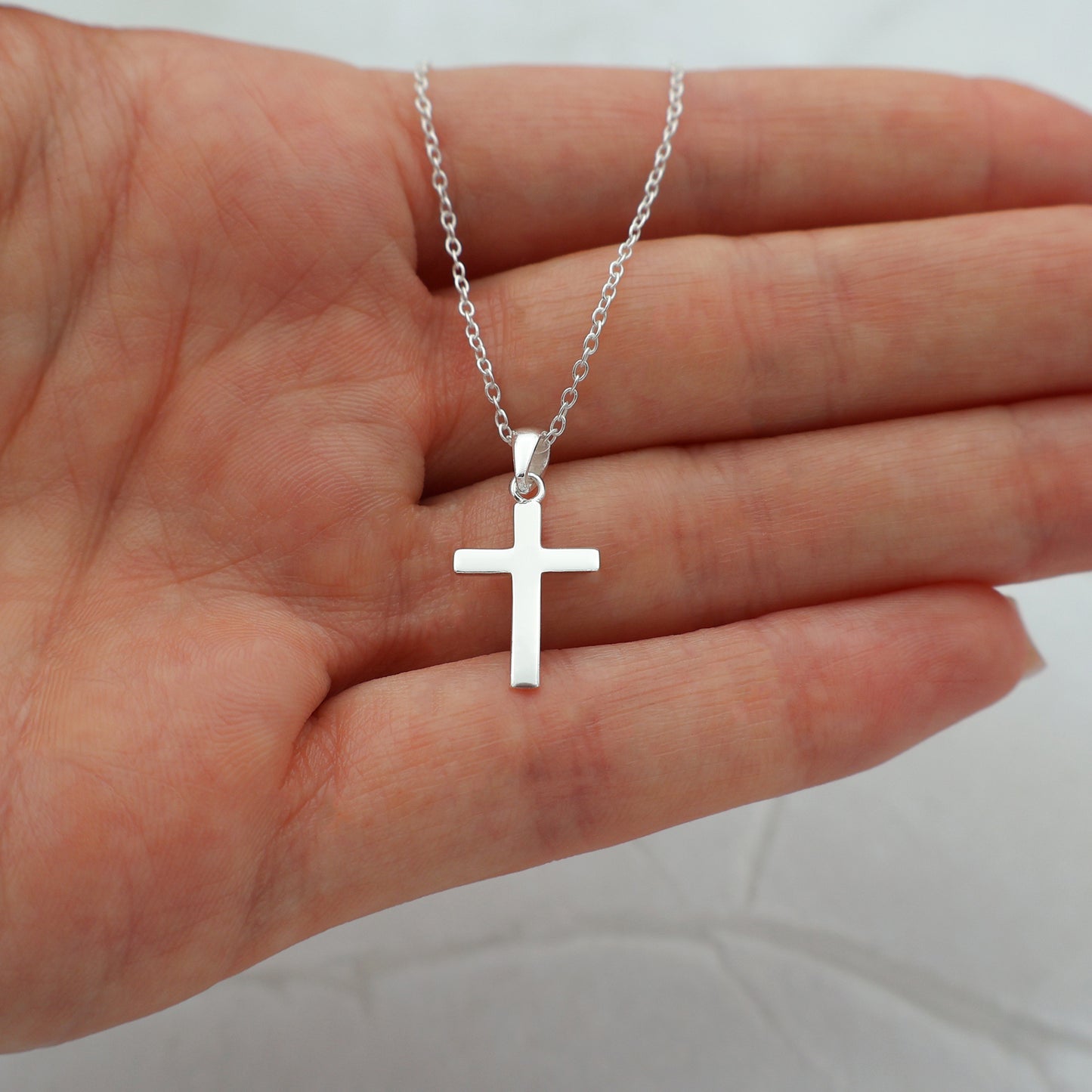 Necklace with a simple cross pendant