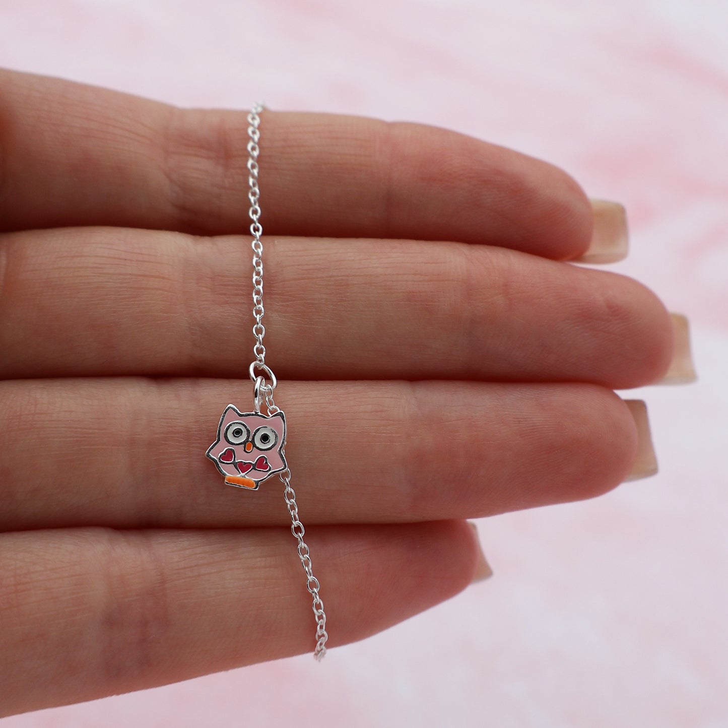 Bracelet with a pink owl and 3 hearts