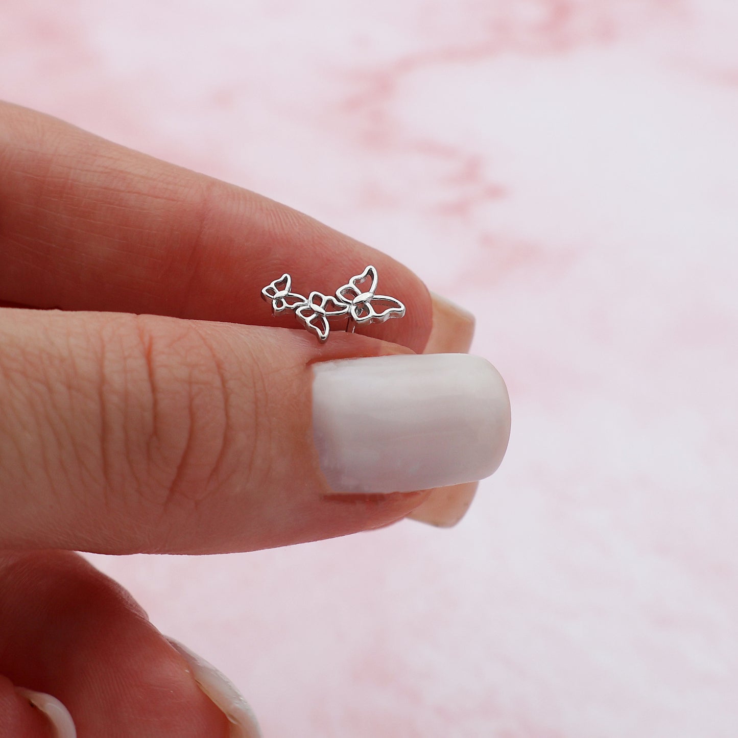 Stud earrings with 3 connected butterflies