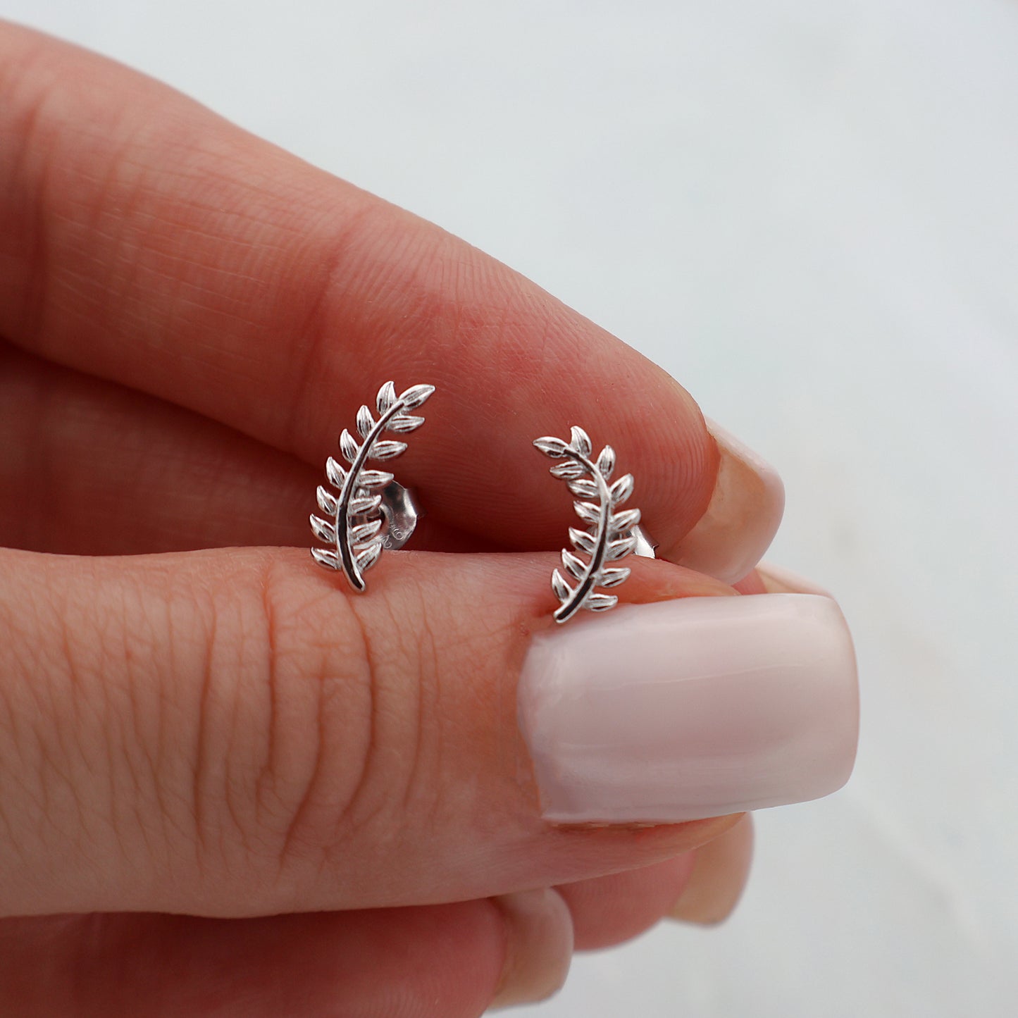 Leaf stud earrings, rhodium plated