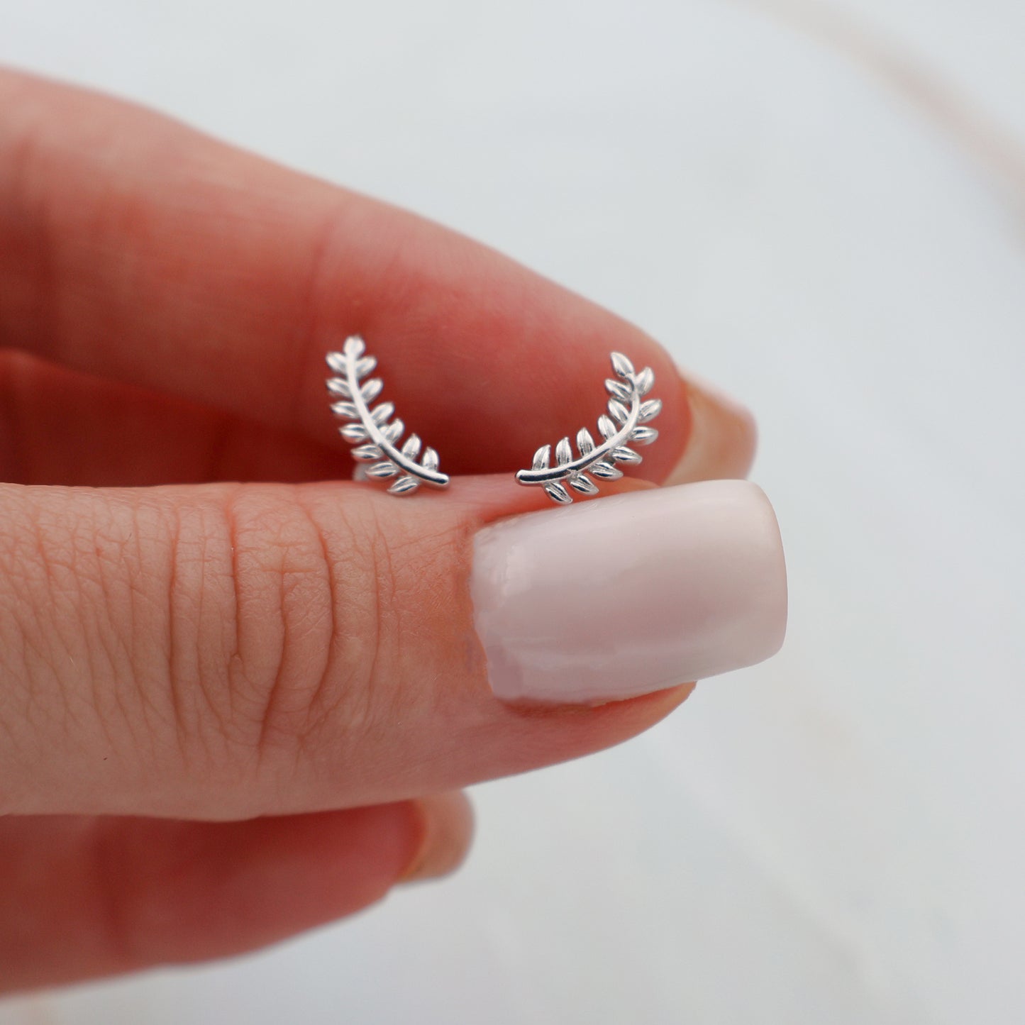 Leaf stud earrings, rhodium plated