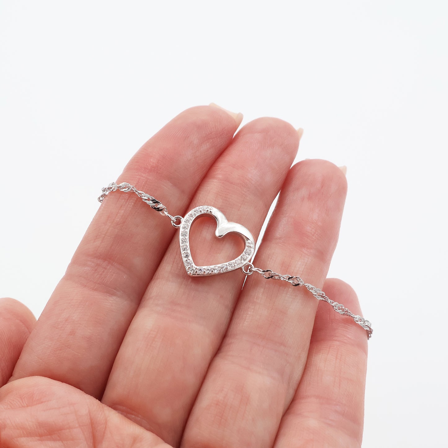 Brățară din argint 925 placată cu rodiu, cu lanț Singapore și inimă cu zirconia albe
